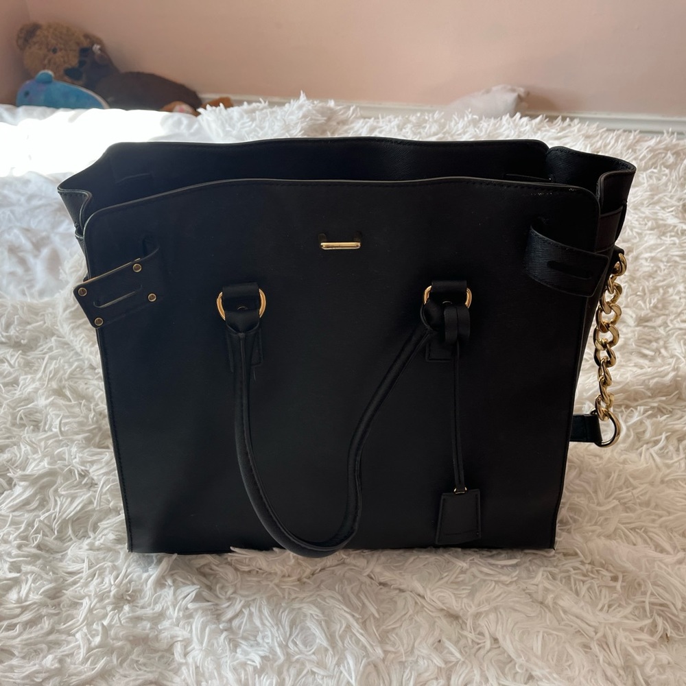 Size large color black with gold hardware